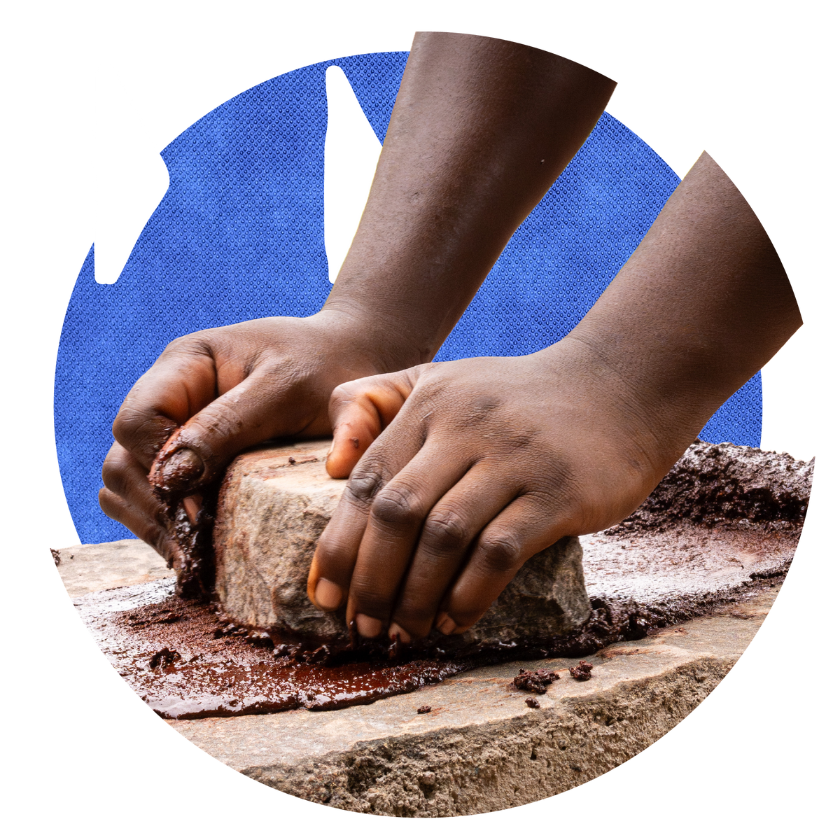 Two hands press shea paste across a stone, on a blue circle.